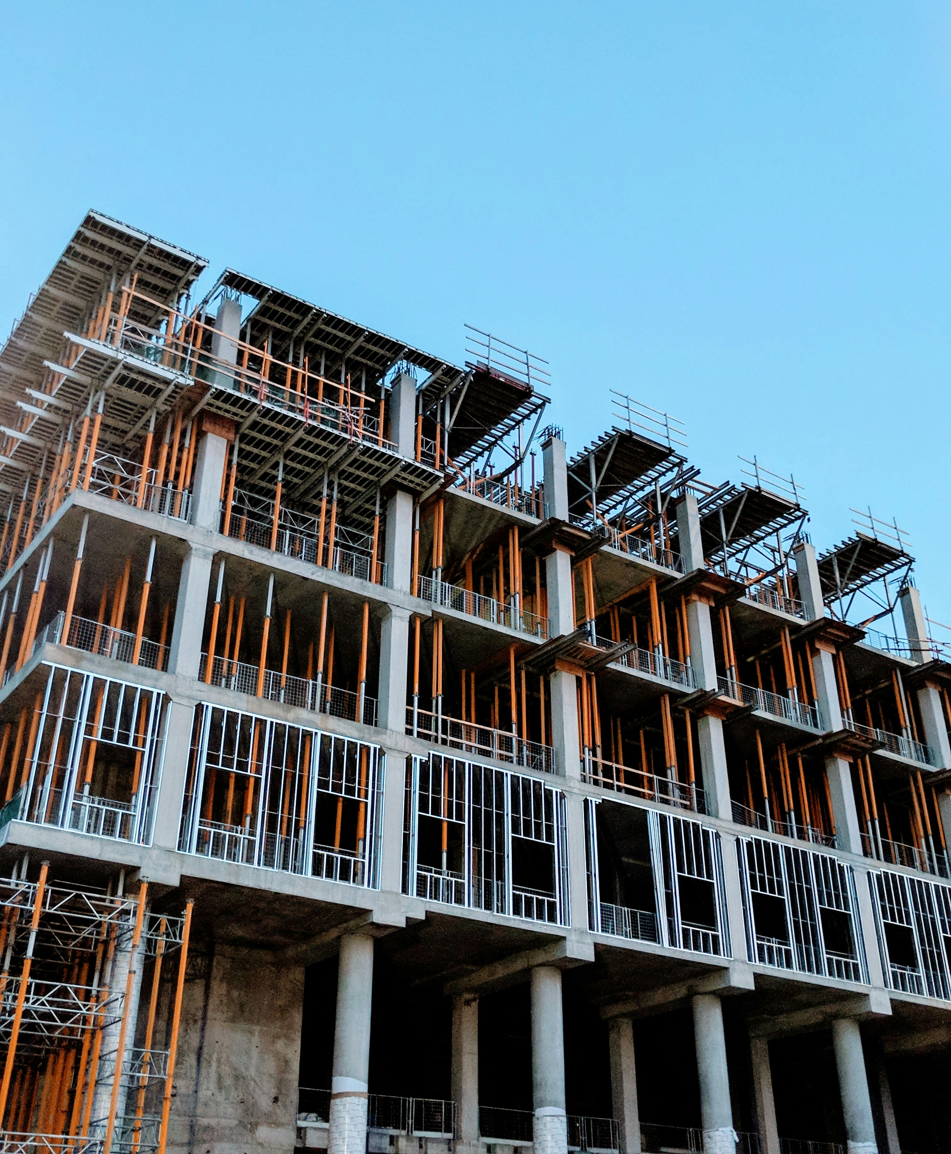 A photo showing the construction of a building in progress